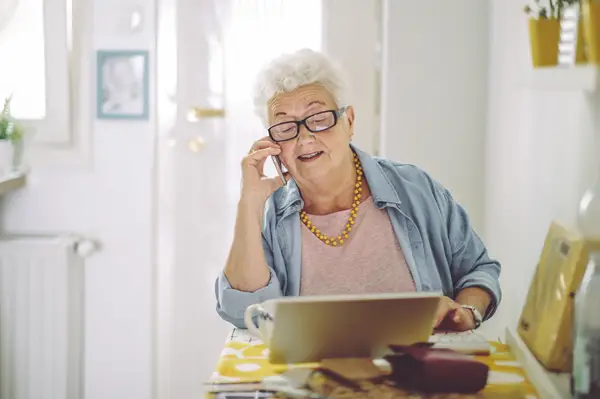 Mature woman with phone